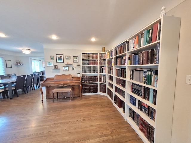 interior space with recessed lighting and wood finished floors