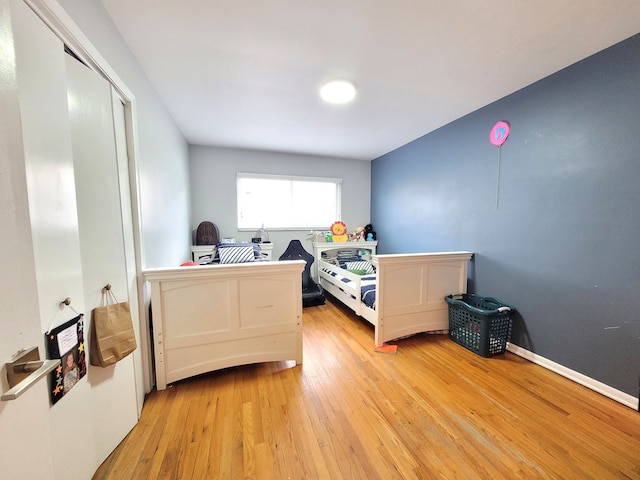 bedroom featuring light wood-style floors