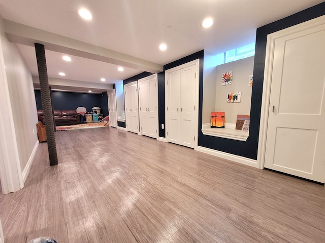 interior space with recessed lighting, baseboards, and light wood-type flooring