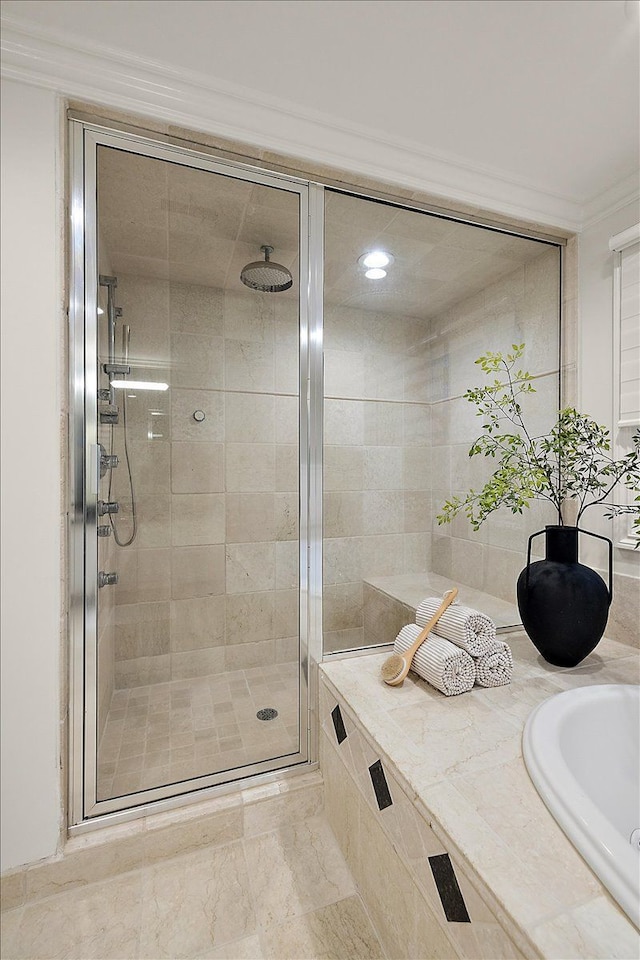 bathroom with a shower stall