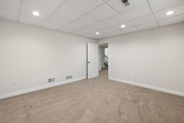 spare room featuring baseboards, carpet flooring, recessed lighting, and visible vents