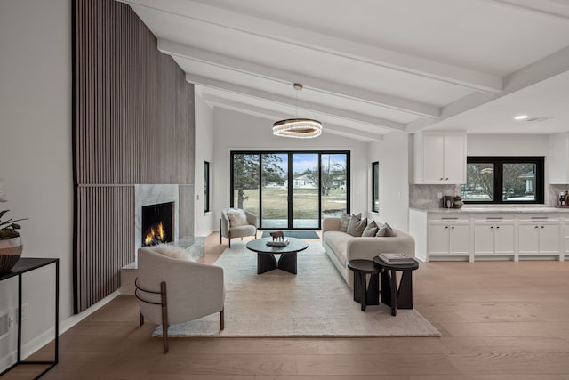 21725 Normandale St, Beverly Hills, MI 48025 - living area featuring light wood-style flooring, a premium fireplace, and recessed lighting