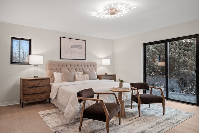 21725 Normandale St, Beverly Hills, MI 48025 - bedroom with light wood finished floors, multiple windows, and baseboards
