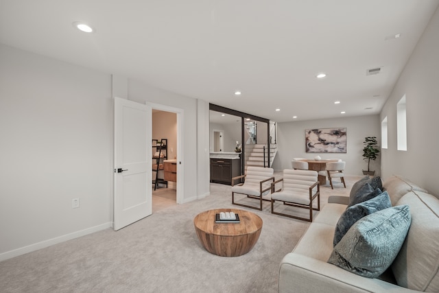 21725 Normandale St, Beverly Hills, MI 48025 - living area with recessed lighting, light colored carpet, baseboards, and stairway