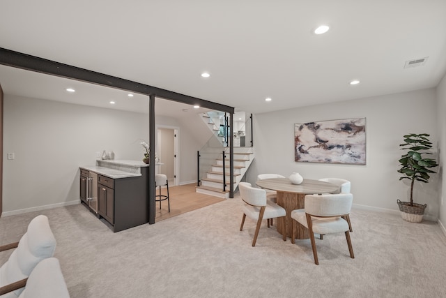 21725 Normandale St, Beverly Hills, MI 48025 - dining area with stairway, wet bar, light carpet, recessed lighting, and baseboards
