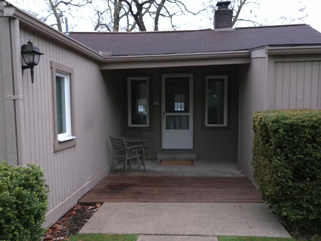 2305 Ridge Rd, White Lake, MI 48383 - doorway to property with a chimney