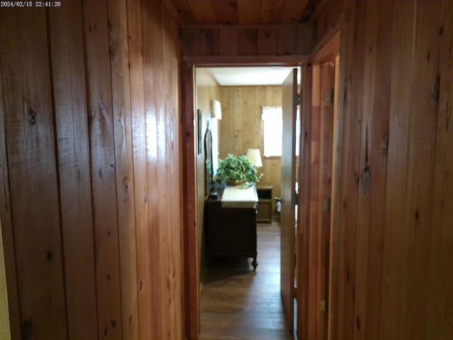 2305 Ridge Rd, White Lake, MI 48383 - hallway featuring wooden walls and wood finished floors