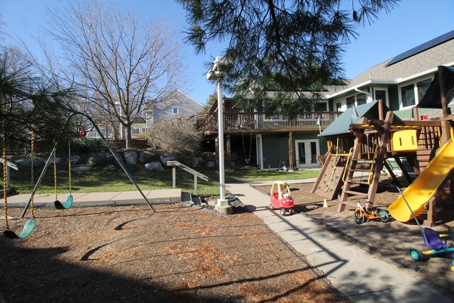 view of playground featuring french doors