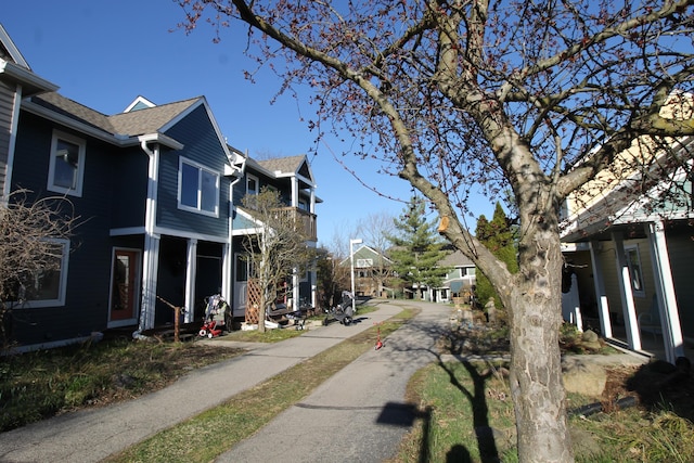 view of street with a residential view and sidewalks