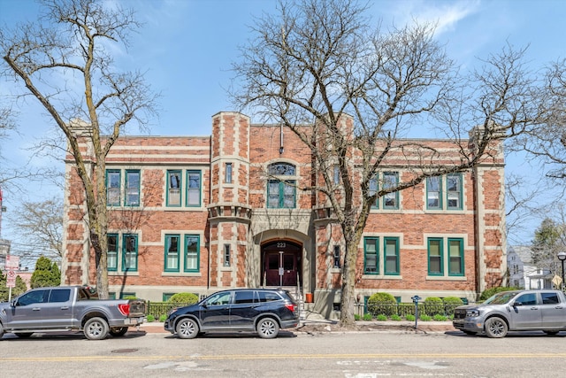 view of front of home with brick siding
