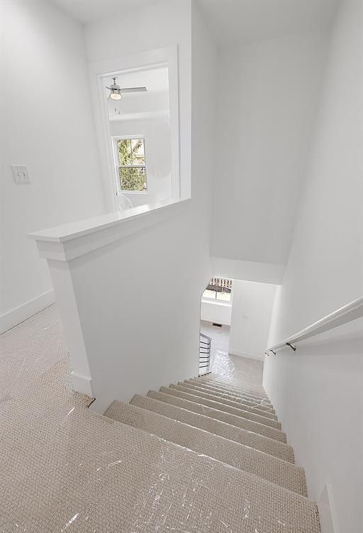 2878 Summers Pl, Troy, MI 48084 - staircase with baseboards