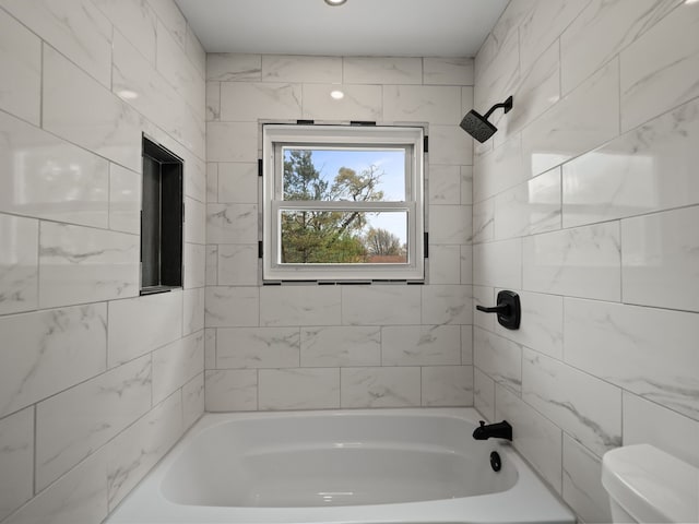 full bath featuring shower / bath combination and toilet