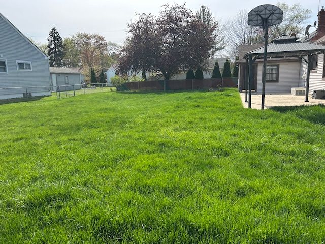 19852 Martin Rd, Saint Clair Shores, MI 48081 - view of yard featuring a gazebo and a patio area