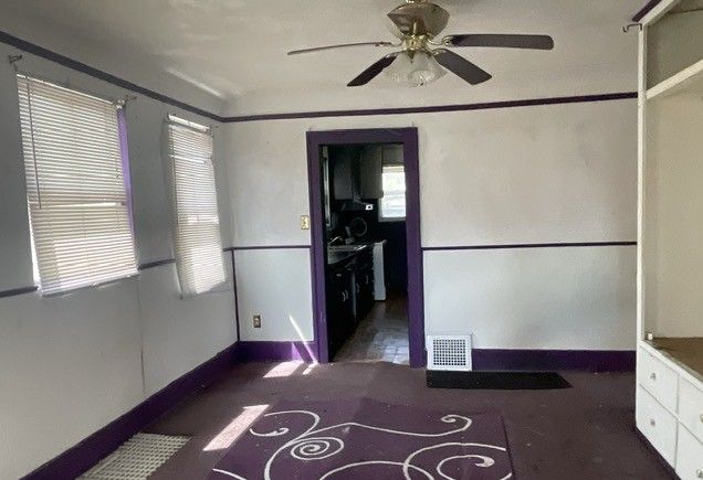 16837 Winthrop St, Detroit, MI 48235 - interior space with a ceiling fan and visible vents