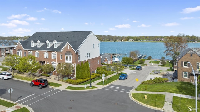 exterior space with a water view