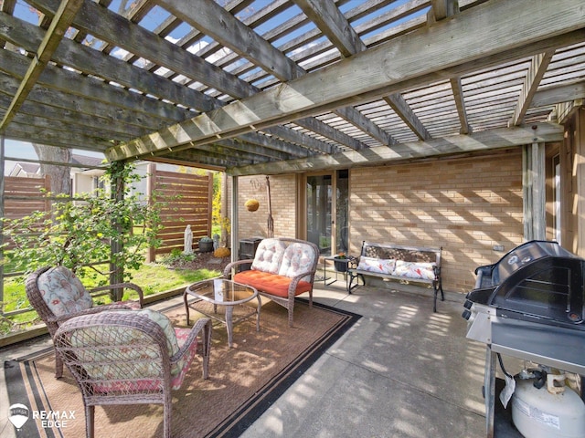 view of patio / terrace featuring outdoor lounge area, fence, a pergola, and area for grilling