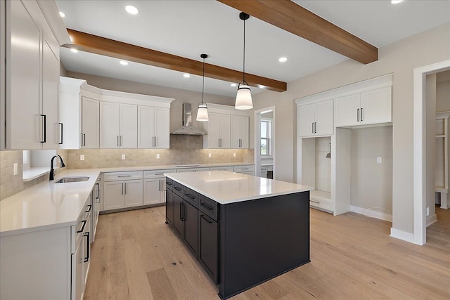 692 Westlake Ave, Oxford, MI 48371 - kitchen with a sink, tasteful backsplash, and white cabinetry