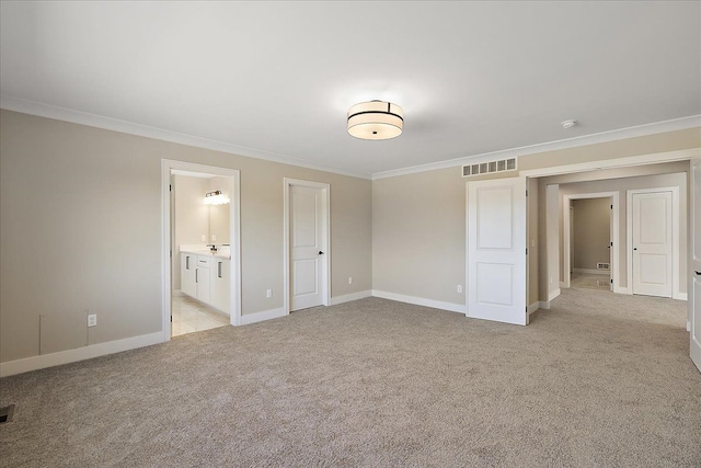 692 Westlake Ave, Oxford, MI 48371 - unfurnished bedroom featuring crown molding, baseboards, light carpet, and visible vents