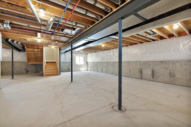 692 Westlake Ave, Oxford, MI 48371 - below grade area featuring stairs
