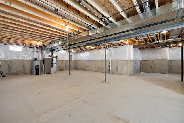 692 Westlake Ave, Oxford, MI 48371 - basement featuring heating unit and water heater