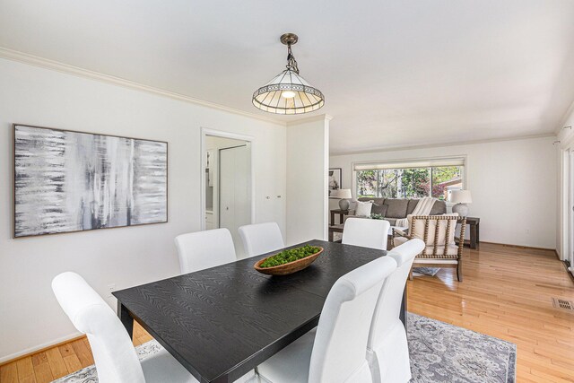 3606 Chatham Way, Ann Arbor, MI 48105 - dining room with ornamental molding, light wood-style flooring, and visible vents