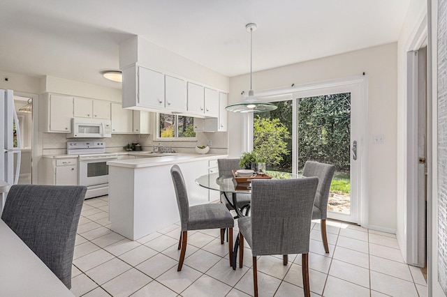 3606 Chatham Way, Ann Arbor, MI 48105 - dining space with light tile patterned flooring