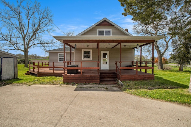 10550 19 1/2 Mile Rd, Marshall, MI 49068 - view of front of property featuring cooling unit and a front yard