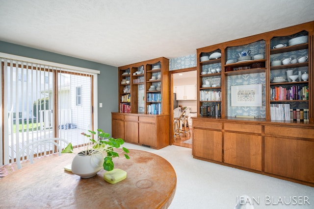 dining area with light carpet