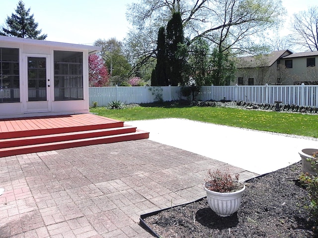 view of patio / terrace featuring french doors, a fenced backyard, and a wooden deck