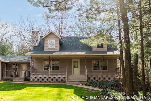 3087 38th St, Hamilton, MI 49419 - view of front of house with covered porch, a chimney, a shingled roof, and a front yard