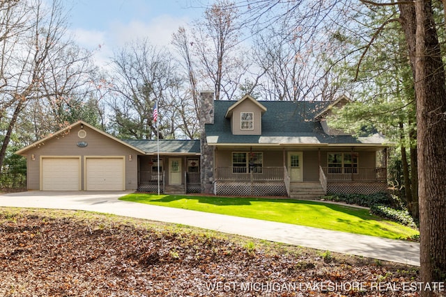 3087 38th St, Hamilton, MI 49419 - view of front of house with an attached garage, a front lawn, a chimney, concrete driveway, and covered porch