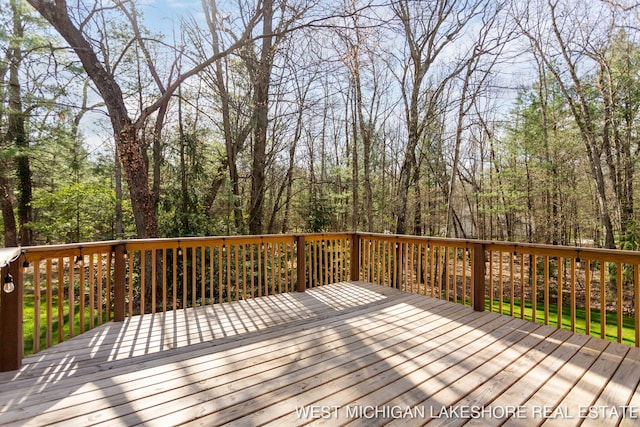 3087 38th St, Hamilton, MI 49419 - wooden deck with a wooded view