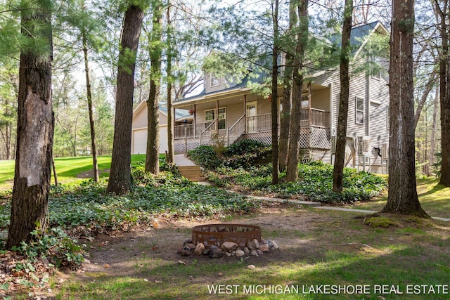 3087 38th St, Hamilton, MI 49419 - view of front facade with covered porch and stairway