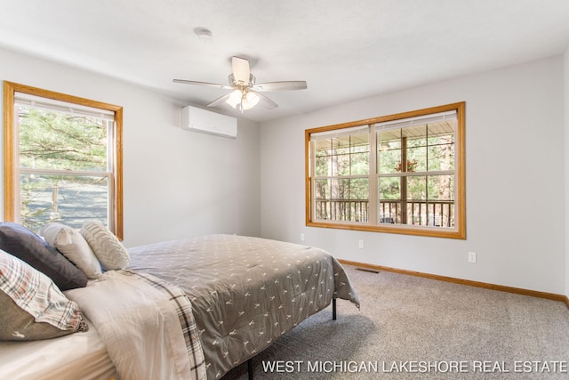 3087 38th St, Hamilton, MI 49419 - carpeted bedroom featuring baseboards, multiple windows, a wall mounted air conditioner, and visible vents