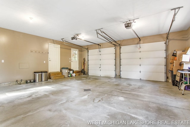 3087 38th St, Hamilton, MI 49419 - garage featuring a garage door opener