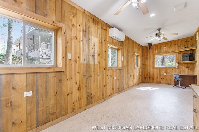 3087 38th St, Hamilton, MI 49419 - interior space featuring wooden walls, baseboards, ceiling fan, and a wall mounted air conditioner