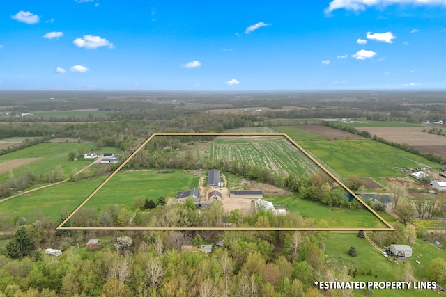 birds eye view of property with a rural view