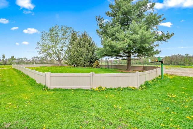 view of yard with fence