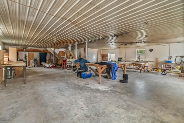 miscellaneous room featuring unfinished concrete floors
