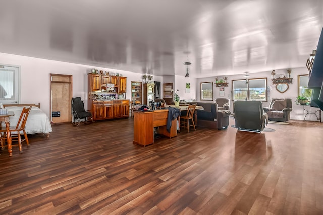 office space with dark wood finished floors