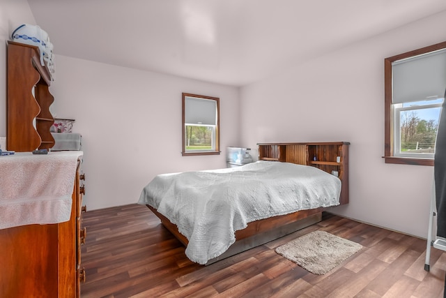 bedroom with wood finished floors