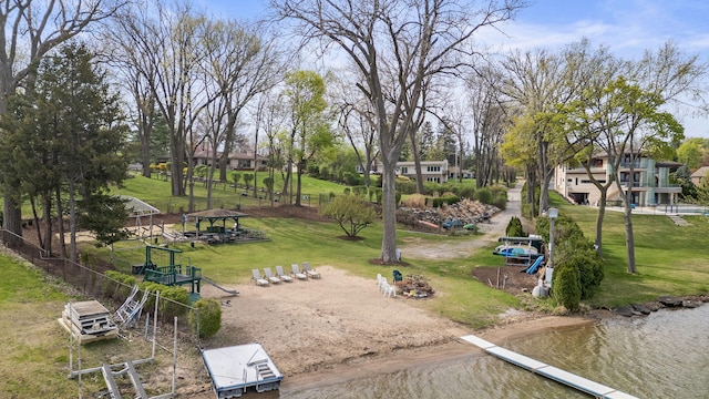 surrounding community with a lawn and a gazebo