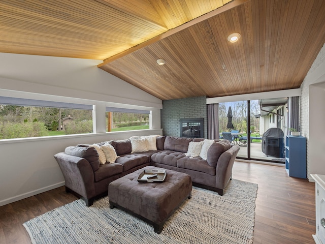 living area featuring recessed lighting, baseboards, wooden ceiling, and a healthy amount of sunlight
