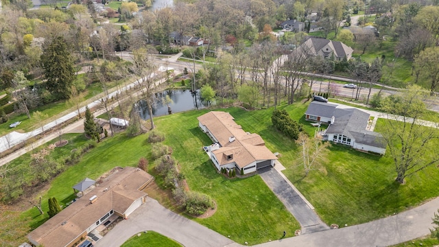 aerial view featuring a water view and a residential view