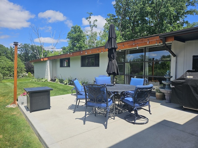 2330 N Pine Center Dr, West Bloomfield, MI 48323 - view of patio featuring area for grilling and outdoor dining space
