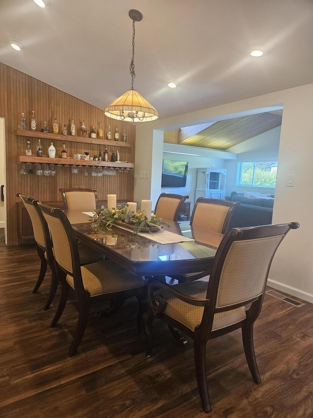 2330 N Pine Center Dr, West Bloomfield, MI 48323 - dining area featuring dark wood-style flooring and vaulted ceiling