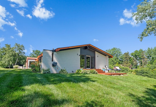 2330 N Pine Center Dr, West Bloomfield, MI 48323 - back of property with a yard and brick siding
