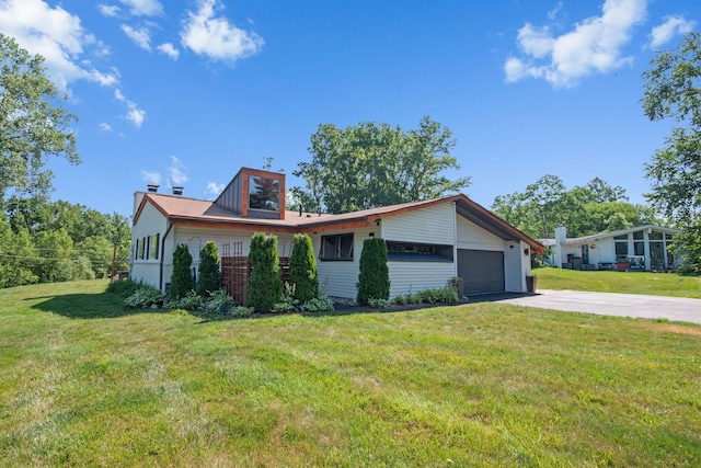 2330 N Pine Center Dr, West Bloomfield, MI 48323 - single story home with a chimney, driveway, a garage, and a front yard