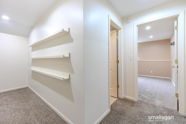 hall featuring recessed lighting, carpet, and baseboards