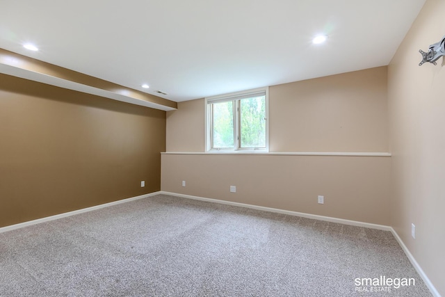 below grade area featuring recessed lighting, carpet flooring, and baseboards